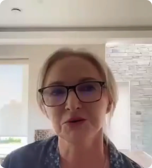 Woman on a video call sharing her testimonial